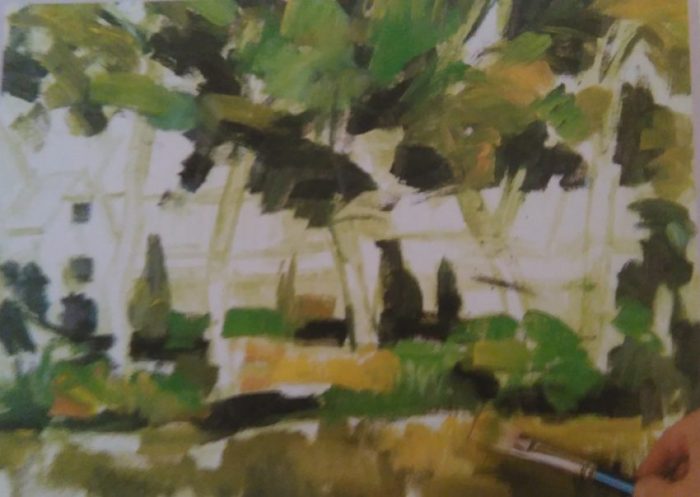 brush sketching the trees in front of a house