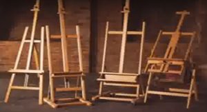 several different wooden easels