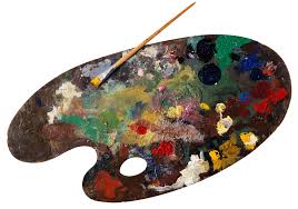 palette covered with different color paint and a paintbrush